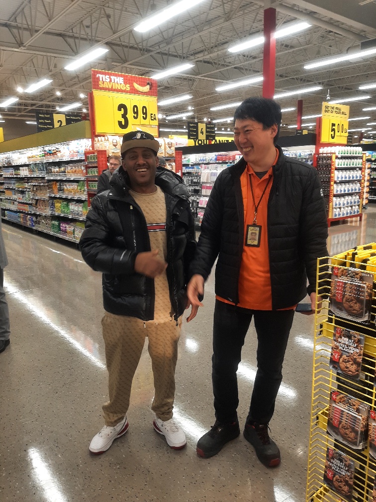 Ameche Cleaning Service team member with store representative
